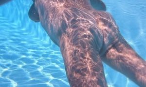 Mature underwater in swimming pool