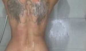 Angel Rivas taking shower